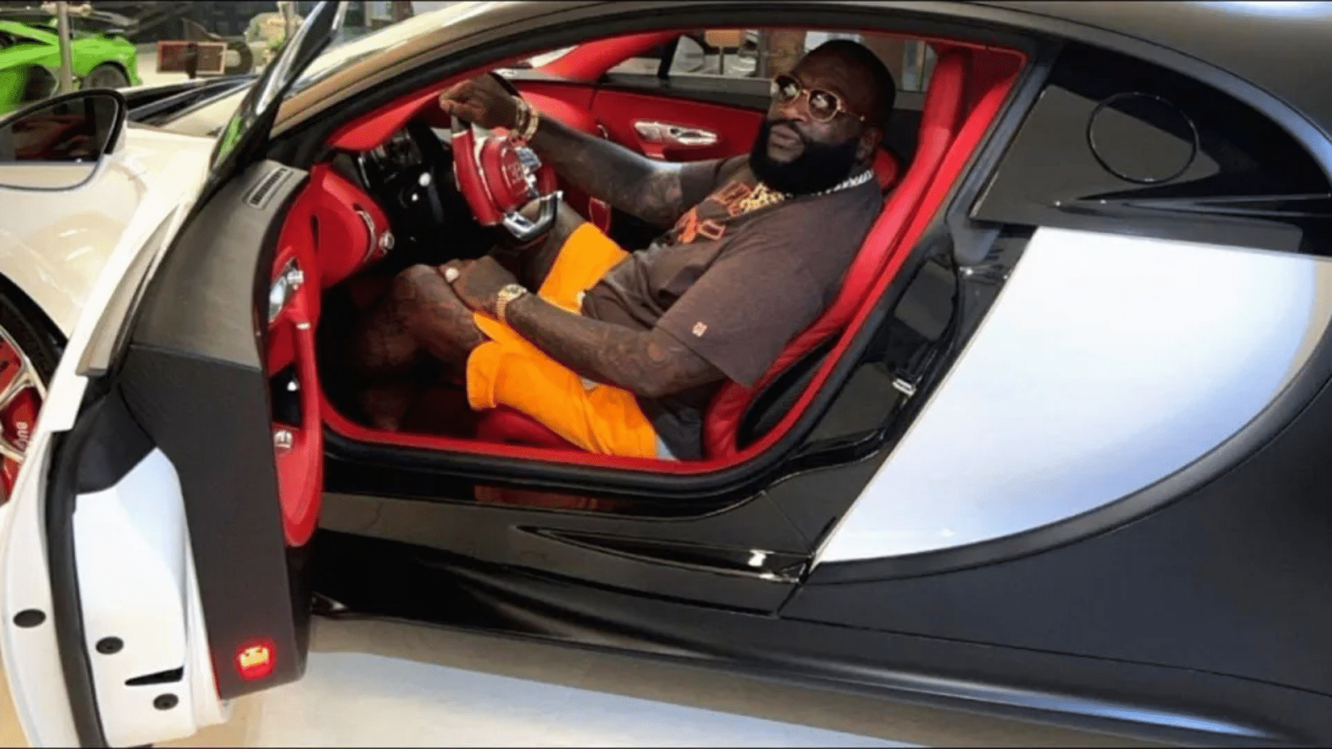 Rick Ross inside a Bugatti Chiron