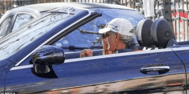 George Clooney and his wife Amal enjoying a drive-through in his Mercedes-AMG E53 Cabriolet