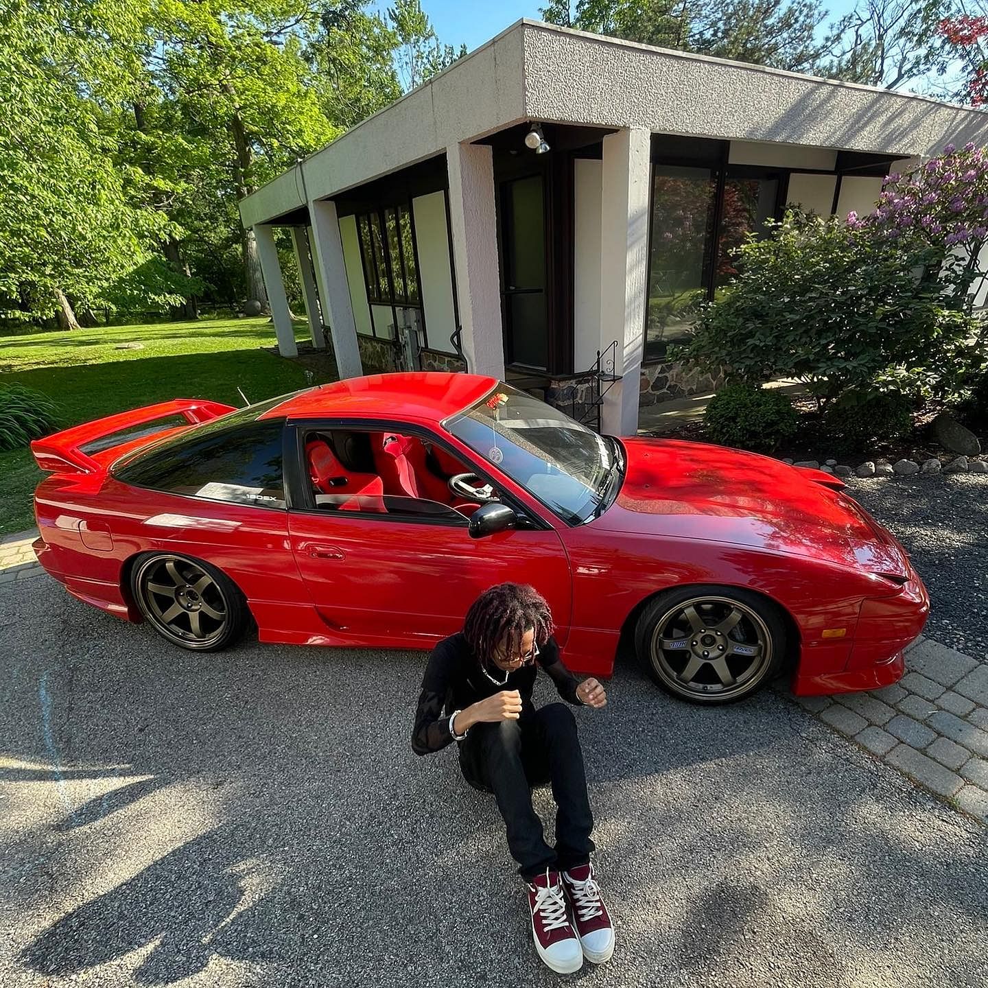 Lil Tecca outsourced a red Nissan 180SX for his 2021 music video "MONEY ON ME""