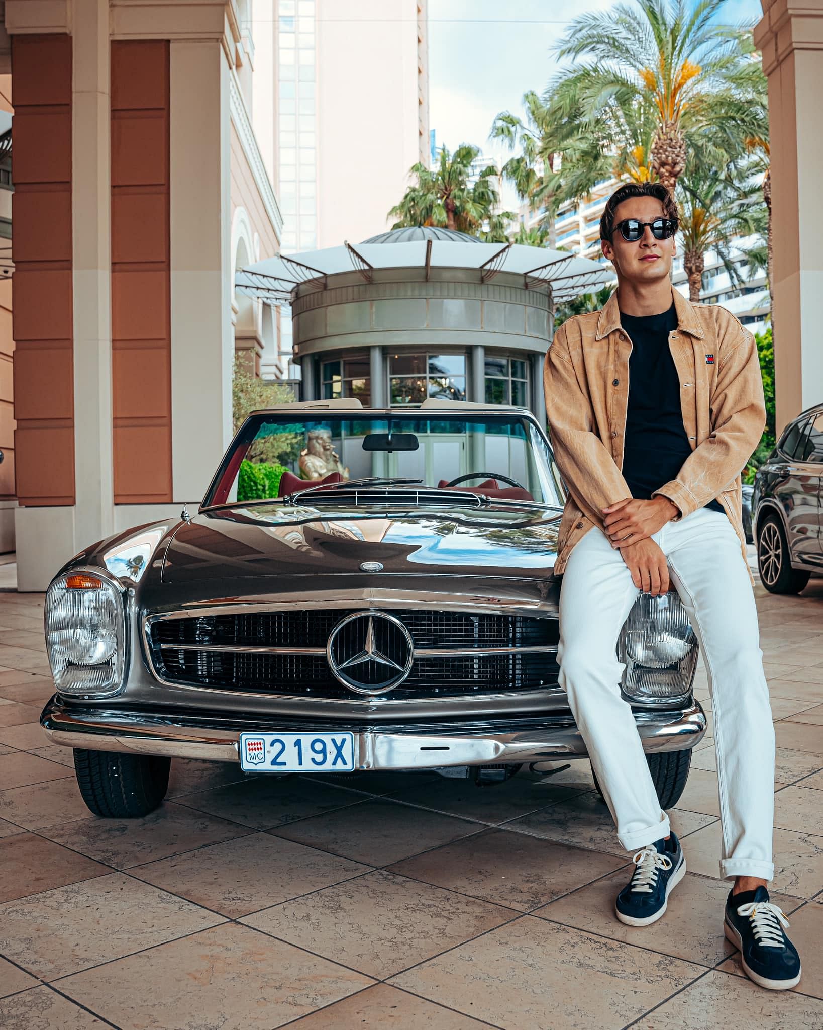 George Russell posing with his Mercedes-Benz 280SL Pagoda at Monaco