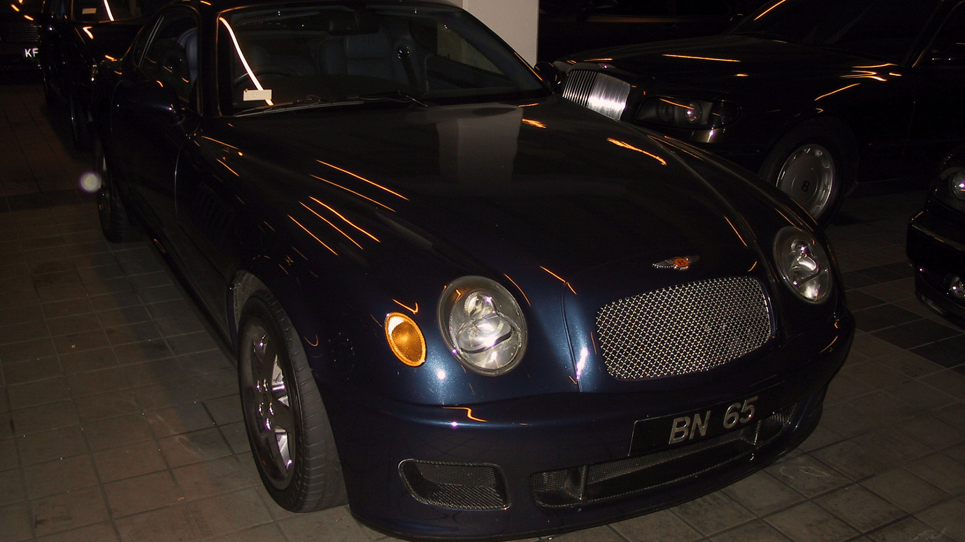 Sultan of Brunei's Bentley Grand Prix shown in dark blue color