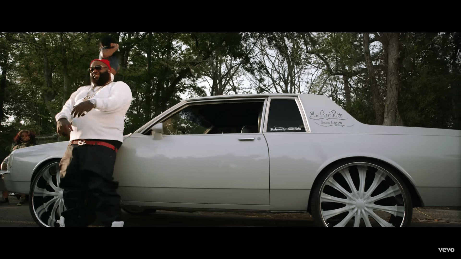 Rick Ross with a 1987 Chevy Caprice in the music video "Box Chevy"